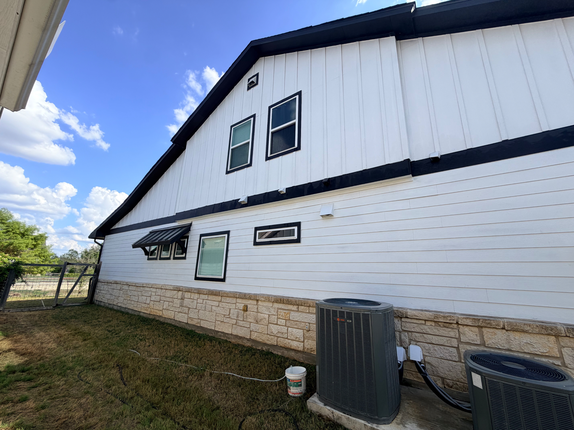 Clean house siding after a professional pressure wash